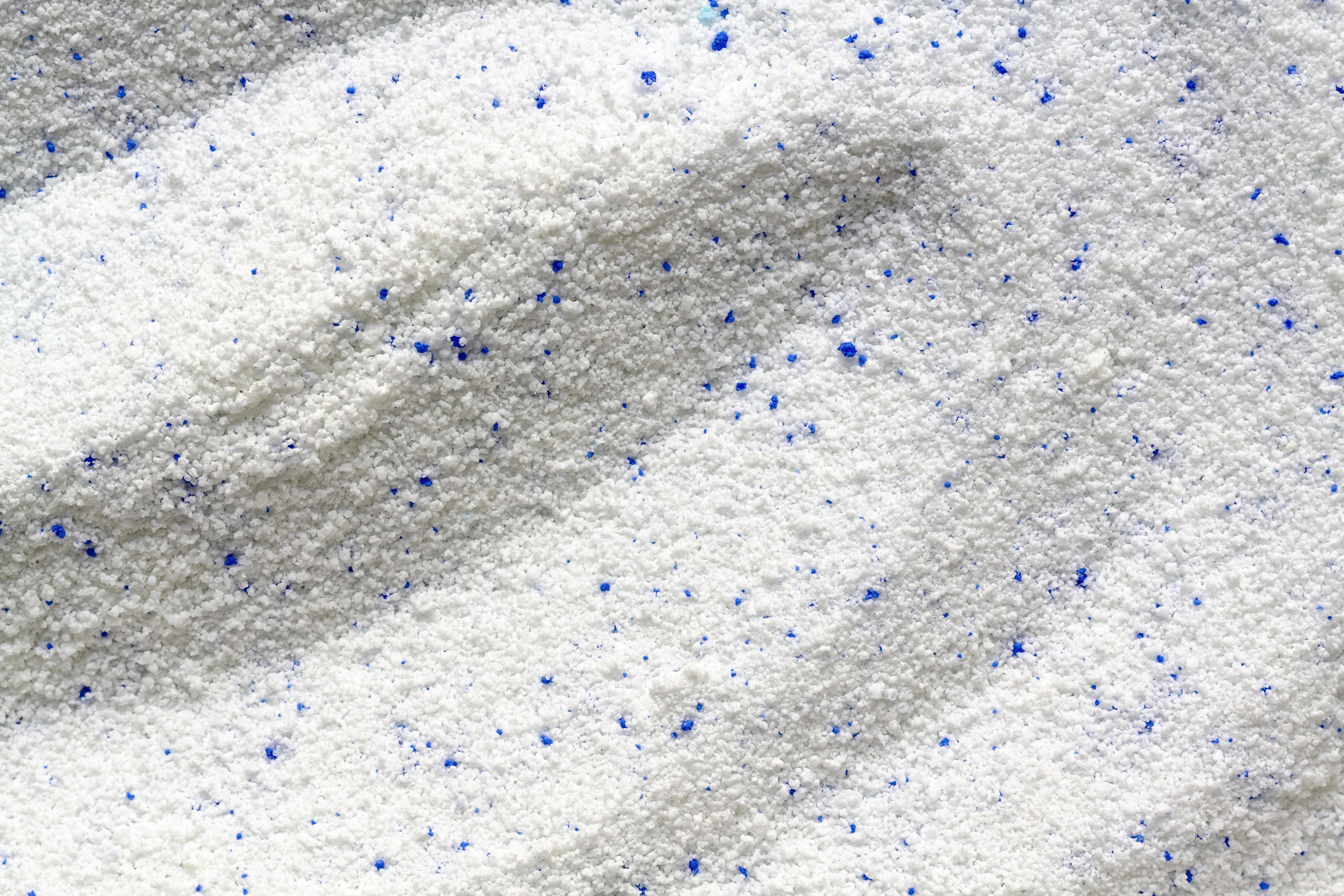 Fine powder dispersed with additives to enhance paint stability and color uniformity